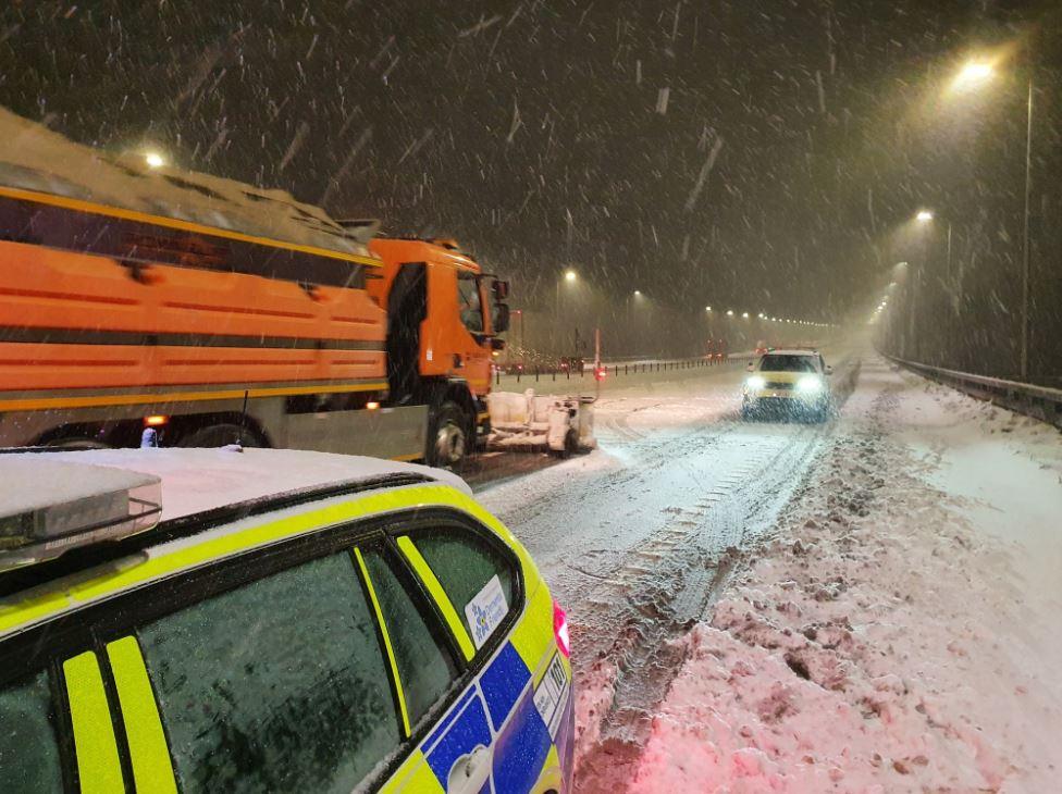 Snow plough clears the M62