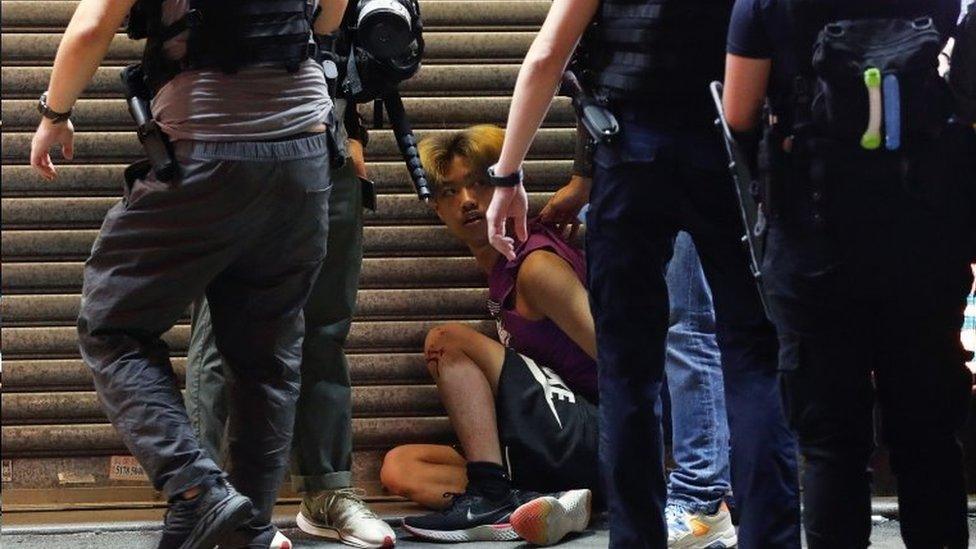 Riot police detain a man in Hong Kong. Photo: 6 September 2020