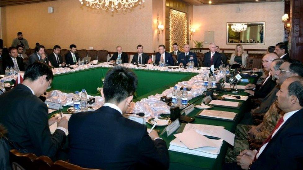 Delegates from Pakistan, Afghanistan, China and the US attend the third round of a meeting at the foreign ministry in Islamabad aimed at getting the Taliban to hold peace talks peace with the Afghan government (06 February 2016)