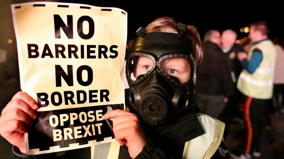 Demonstrators protest at the Carrickcarnon border crossing on the road between Dundalk in the Republic of Ireland and Newry in Northern Ireland