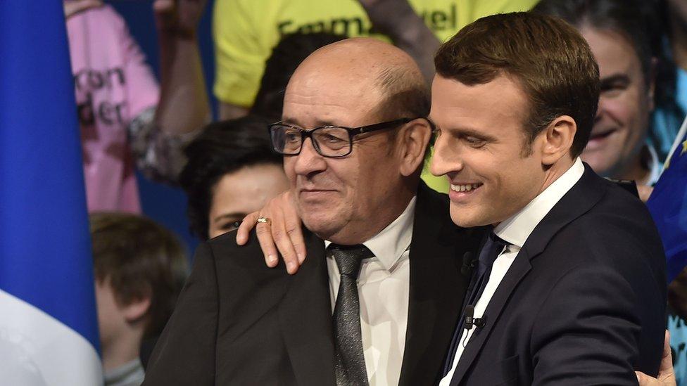 Yves Le Drian (L) and Emmanuel Macron