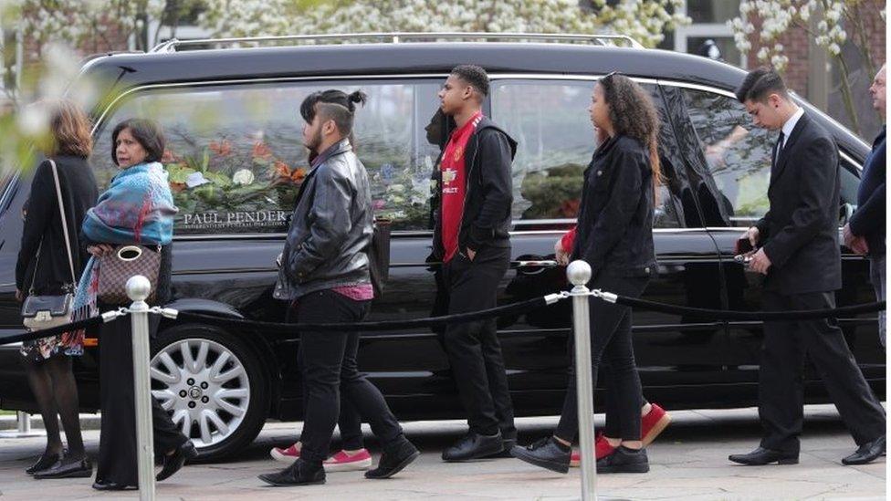 Mourners outside the Ragoobeer funeral