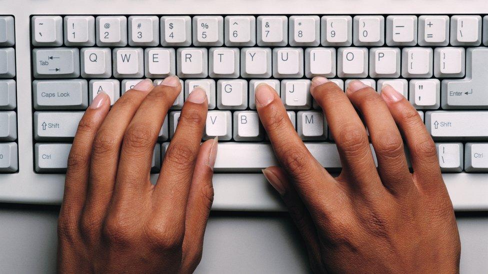 Hands typing