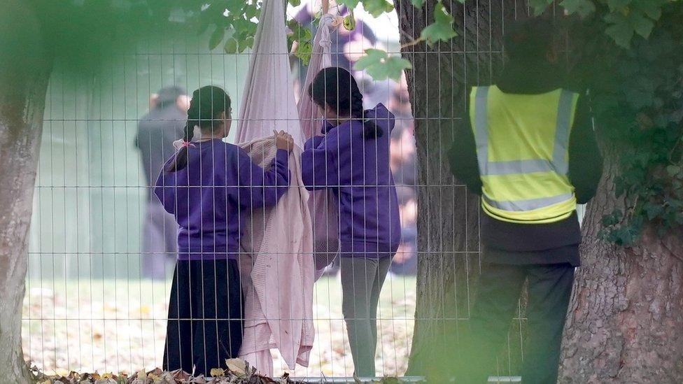 Children play inside the Manston immigration short-term holding facility located at the former Defence Fire Training and Development Centre in Thanet, Kent. Picture date: Tuesday November 1, 2022. PA Photo. Home Secretary Suella Braverman has denied ignoring legal advice to procure more accommodation amid warnings the temporary holding centre at Manston in Kent was dangerously overcrowded. Photo credit should read: Gareth Fuller/PA Wire