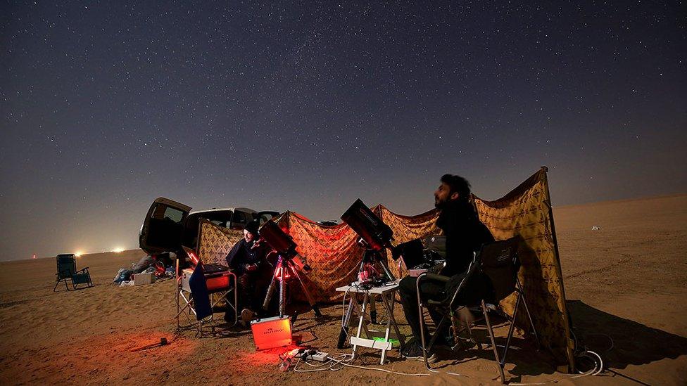 Photographers in the desert