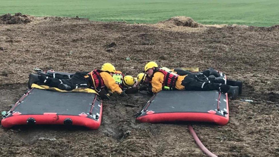 Fire service trying to rescue man