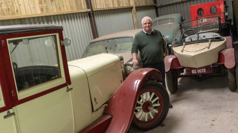 Jim Ronan with one of the cars