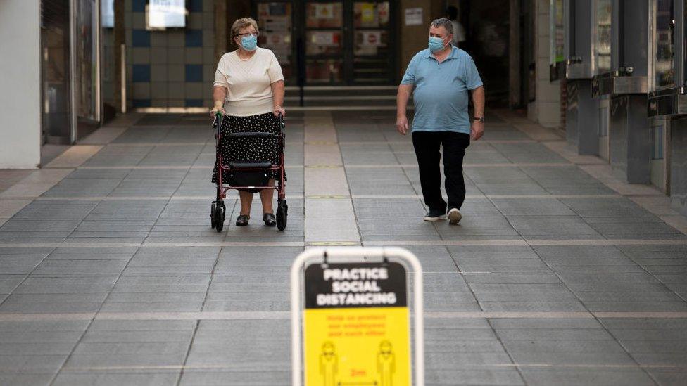 People in a shopping centre in Bridgend