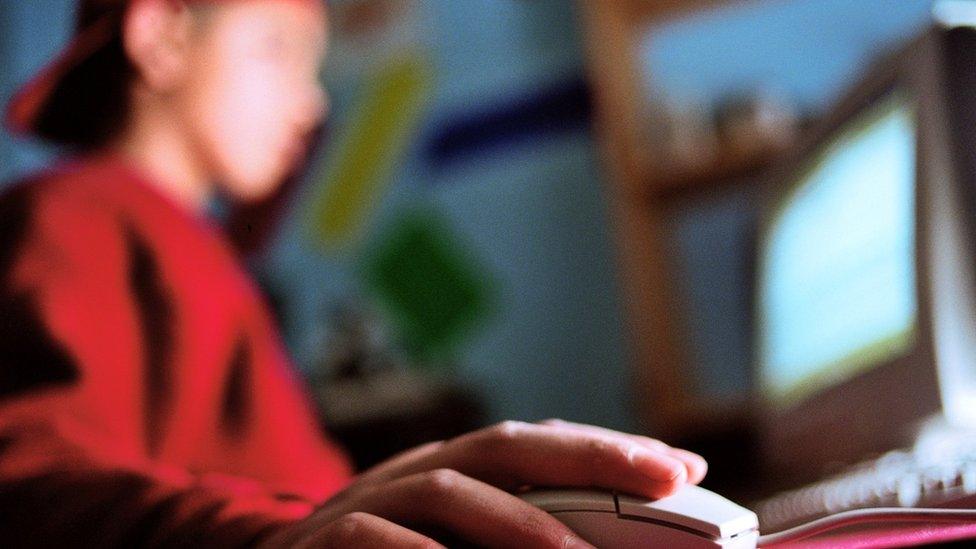 Boy using computer