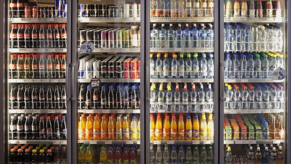 A large glass door refrigerator