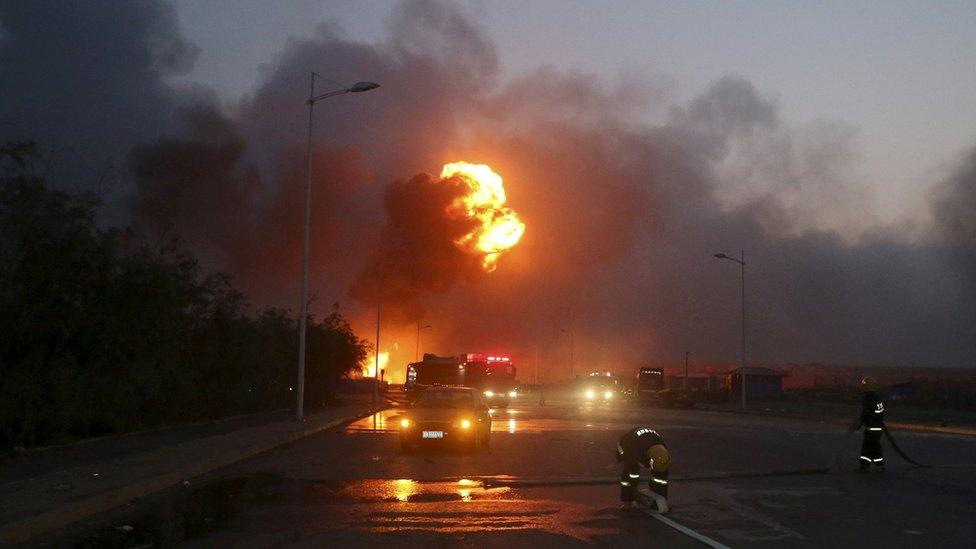 Fire fighters at explosion site