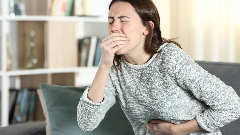 Woman feeling sick