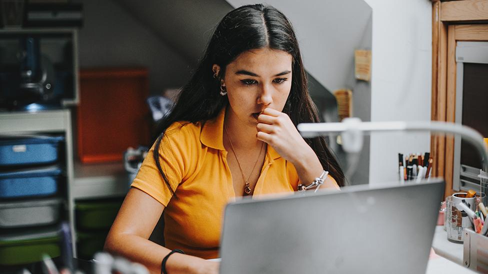 Woman using laptop