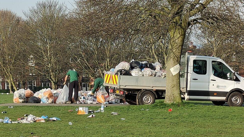 Leeds City Council workers remove litter from Woodhouse Moor