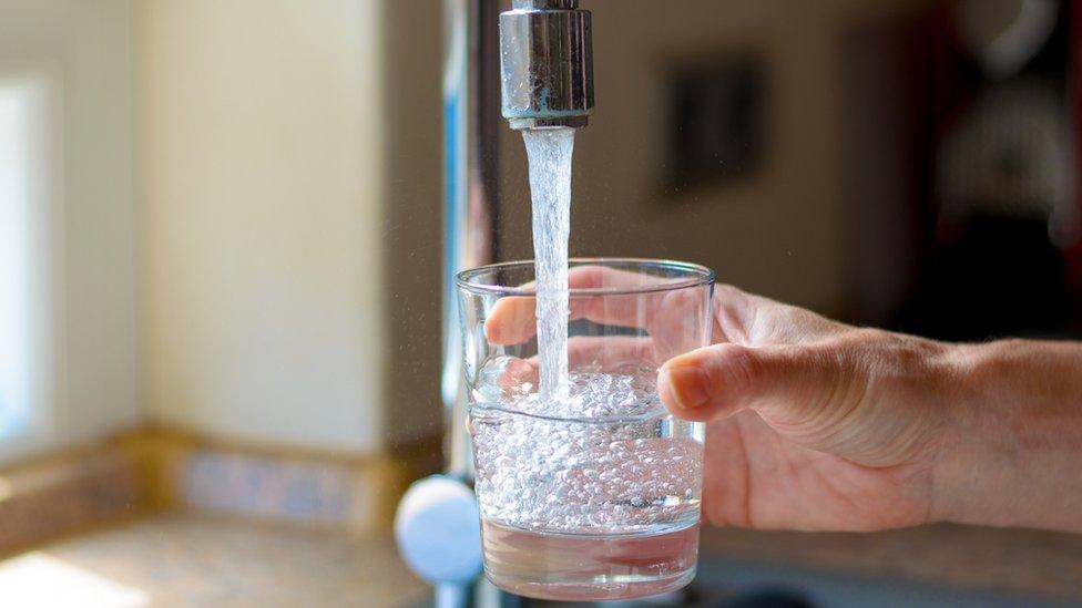 Water flowing from tap
