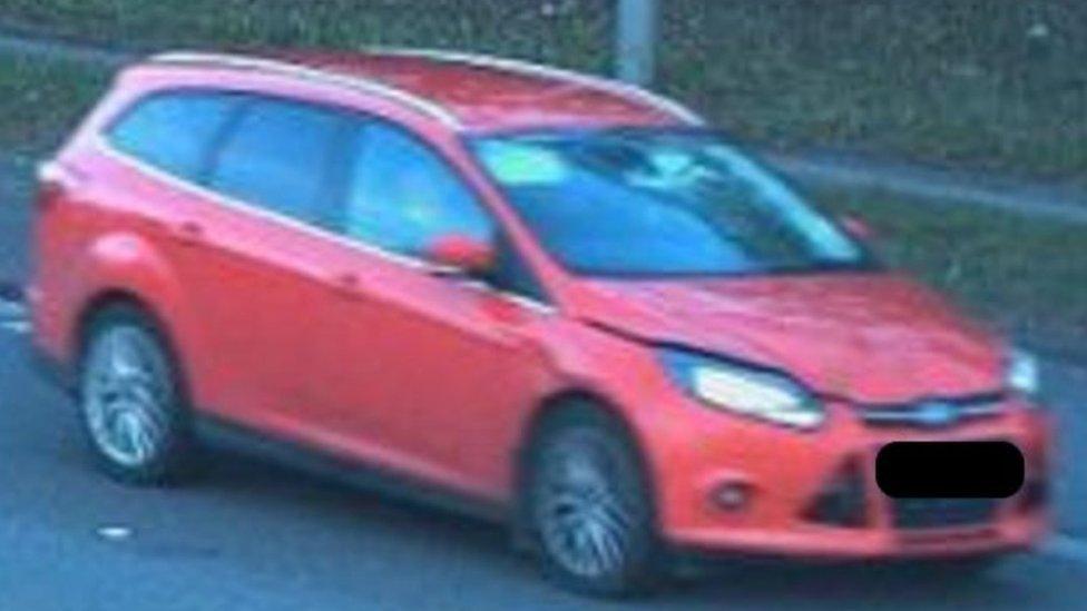 Red Ford Focus estate