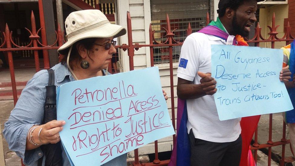 Danuta Radzik, founding member of NGO Help & Shelter and joel Simpson, Managing Director of SASOD protest outside the Magistrates Court on 10 March 2017