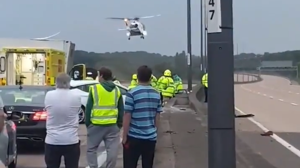 Helicopter lands on motorway