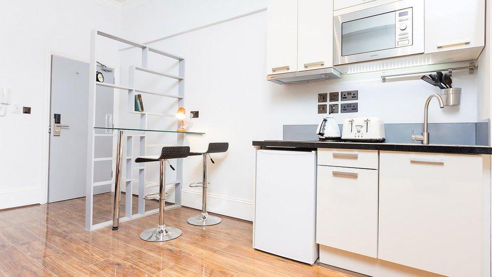 Very modern, clean kitchen area