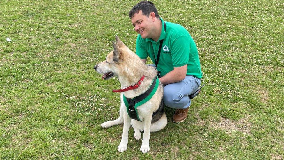 Chris Bennett from Woodgreen with a dog