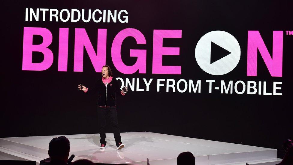 T-Mobile CEO John Legere introduces Binge On during the Un-carrier X press conference at the Shrine Auditorium on Tuesday, Nov. 10, 2015, in Los Angeles.