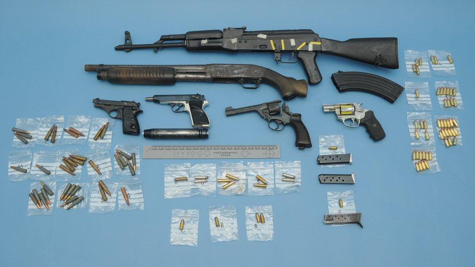Guns and ammunition seized from a loft on Rylands Drive in Warrington