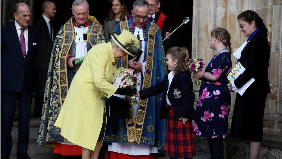 The Queen getting flowers