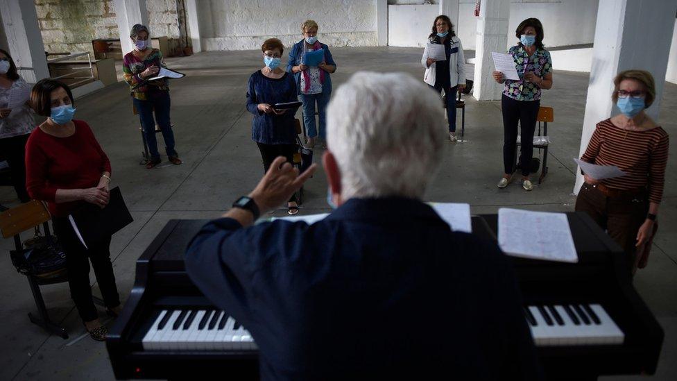 Choir rehearsing in face masks