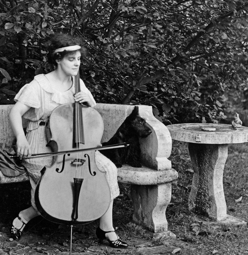 Beatrice Harrison playing the cello in her garden