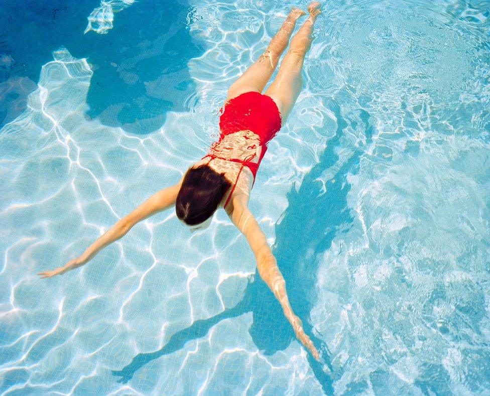 A girl in a swimming pool