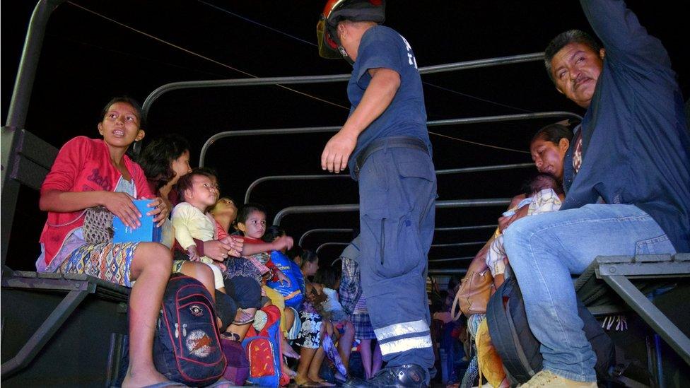 People evacuated from their coastal town after an earthquake struck off the southern coast, in Puerto Madero, Mexico September 8, 2017