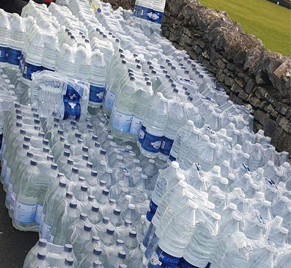 Water bottles piled up