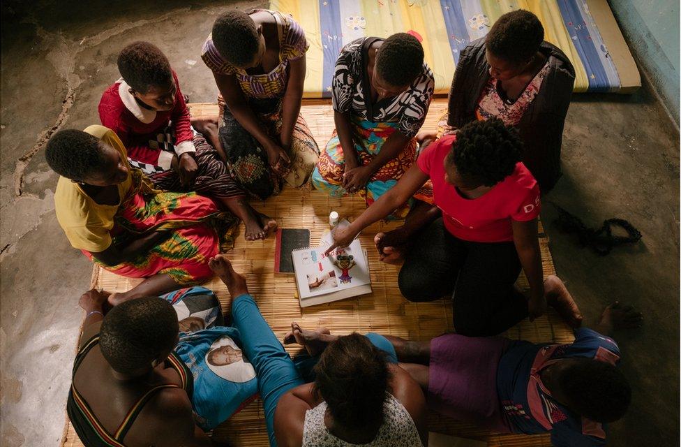 A group of women receive contraception education