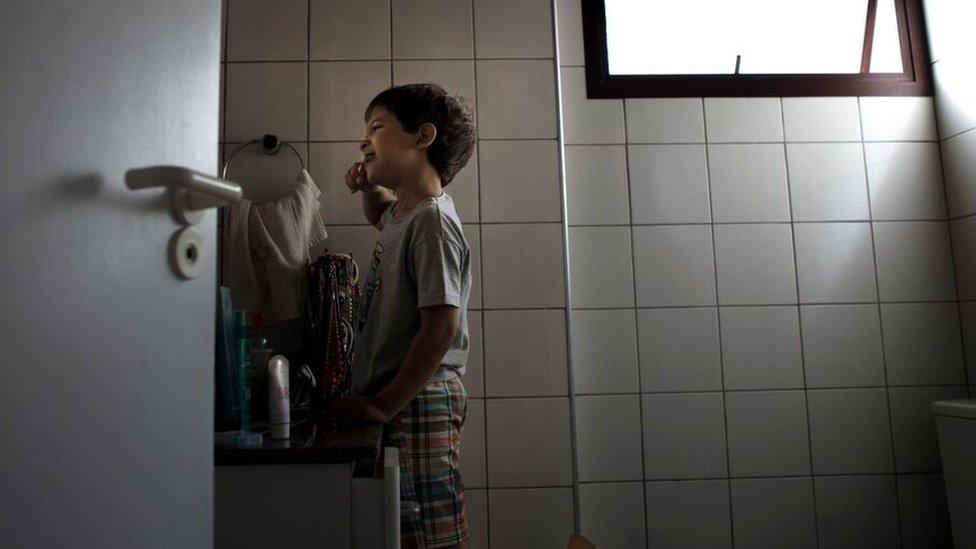 Joao, brushing his teeth