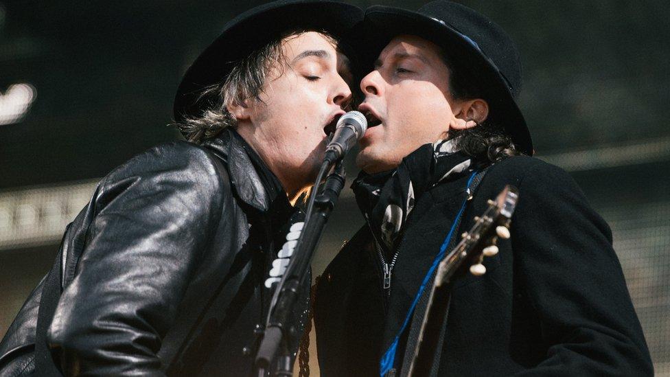 Pete Doherty and Carl Barat performing with The Libertines