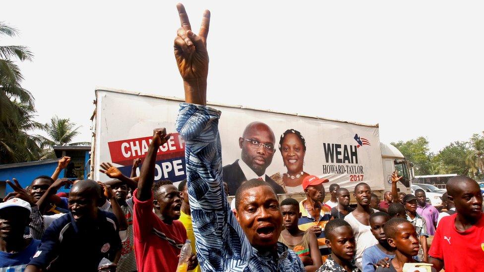 Supporters of George Weah, former soccer player and presidential candidate of Coalition for Democratic Change (CDC), celebrate after the announcement of the presidential election results in Monrovia, Liberia December 28, 2017