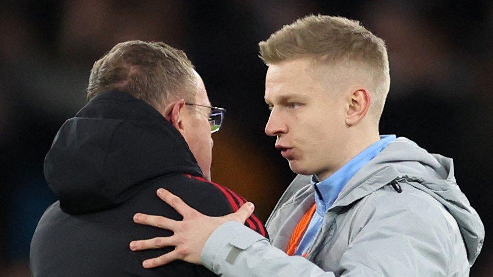 Manchester United manager Ralf Rangnick embraces Oleksandr Zinchenko