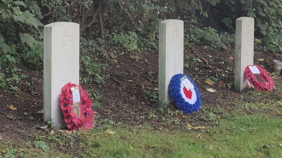 Wreaths at three graves at St Peter's Churchyard, East Bridgford