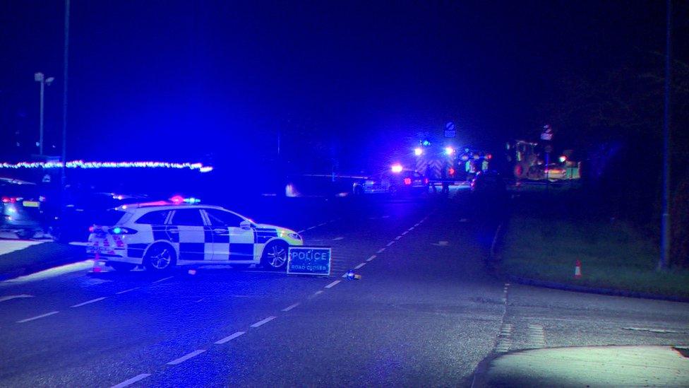 Police vehicles at the scene of the crash on the Moneysharvan Road near Maghera