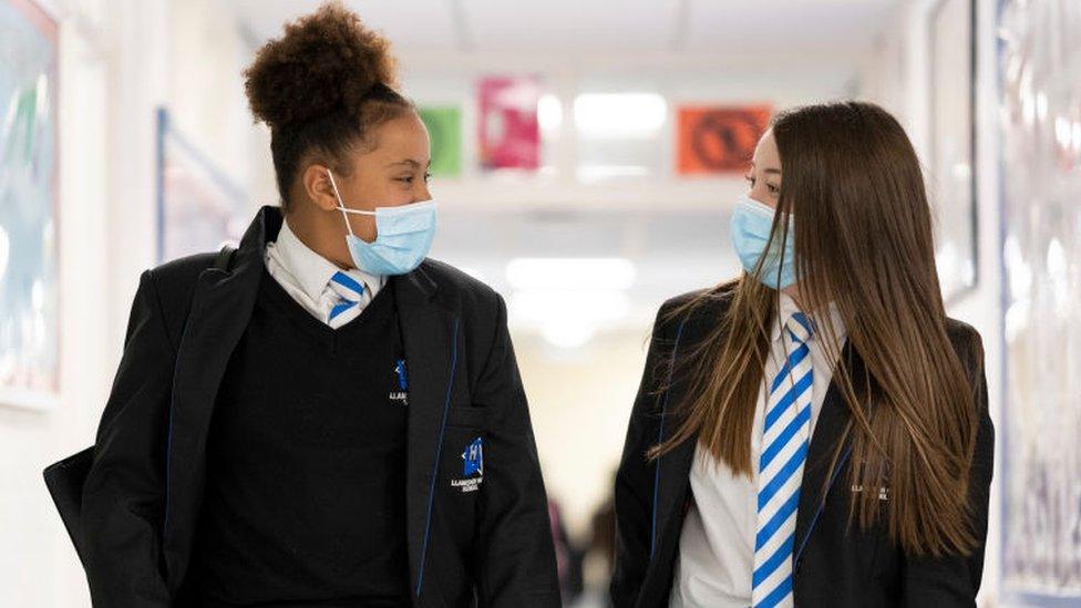 secondary school girls in masks