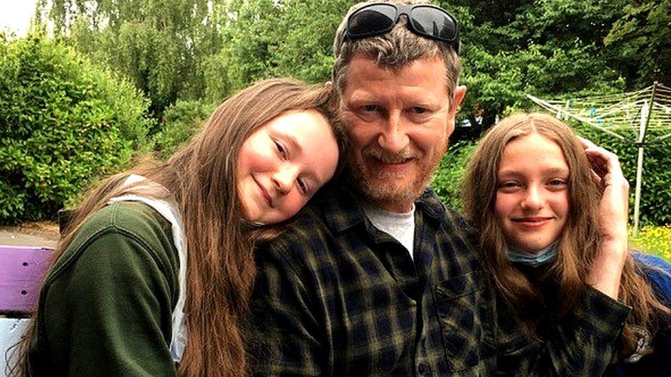 Howard Holden with his daughters