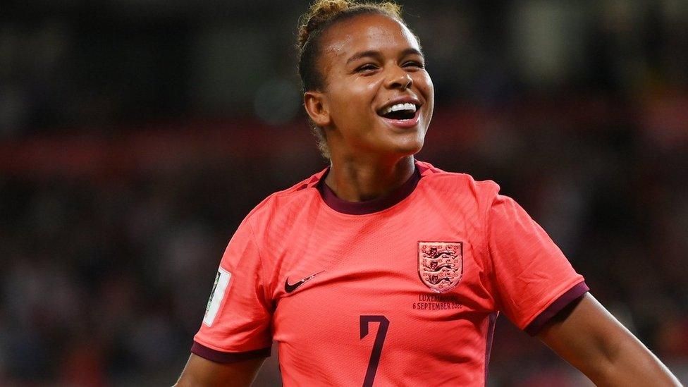 England Women's Nikita Paris smiling and celebrating.