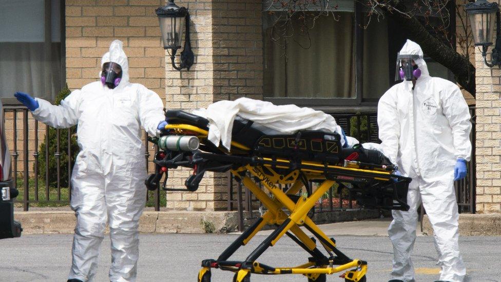 Medical workers load a deceased body into an ambulance at Andover Subacute and Rehabilitation Centre on 16 April 16 2020 in Andover, New Jersey, USA.