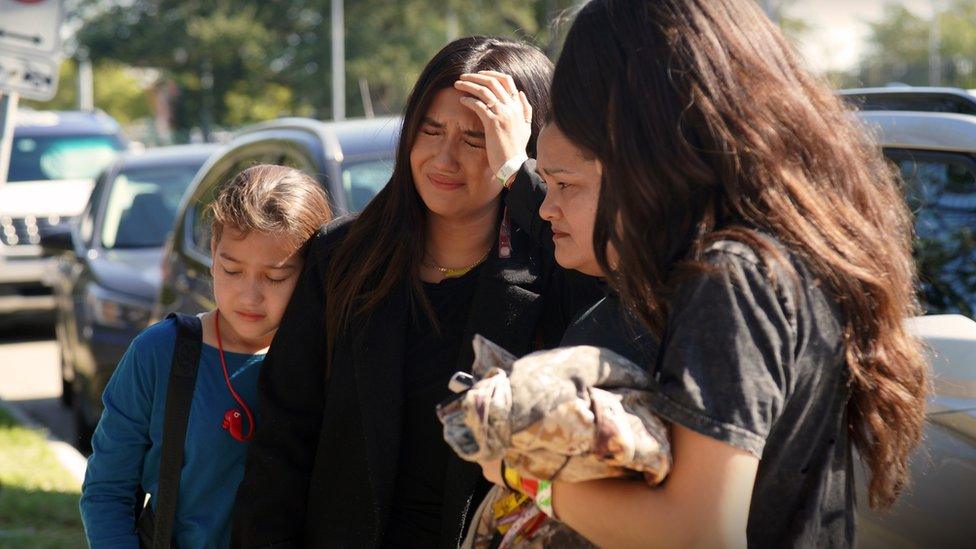 Festival attendees are paying tribute to the victims of Astroworld at a makeshift memorial