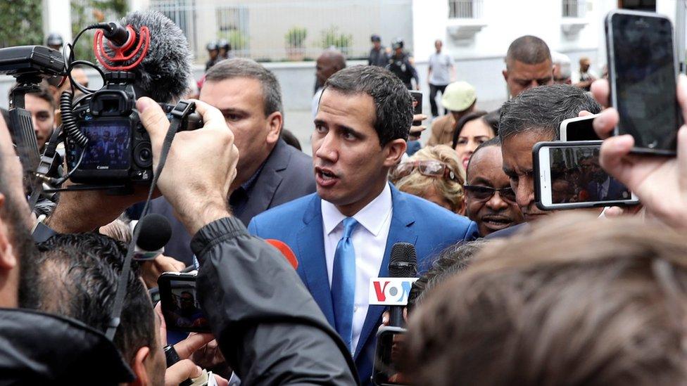 Juan Guaidó speaking to reporters