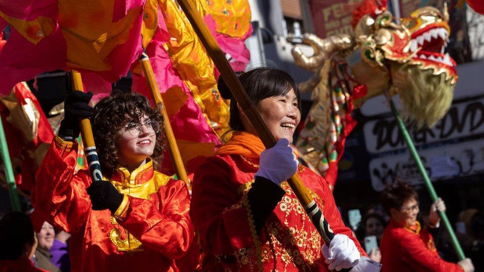 Participants take part in the Chinese New Year parade at Usera neighborhood on January 22, 2023 in Madrid, Spain.