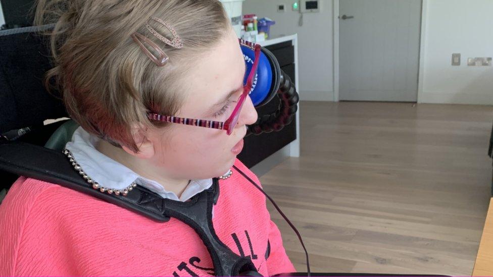 Meabh Bradley, who has cerebral palsy and is non-verbal, enjoys interacting with her friends on the internet