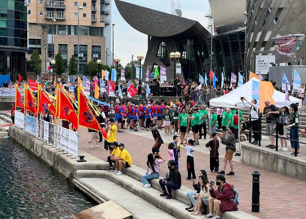 participants line up outside the Lowry Theatre