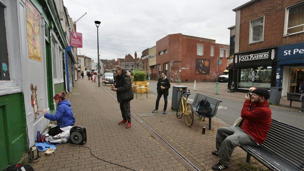 Creating a mural on a wall in Bedminster