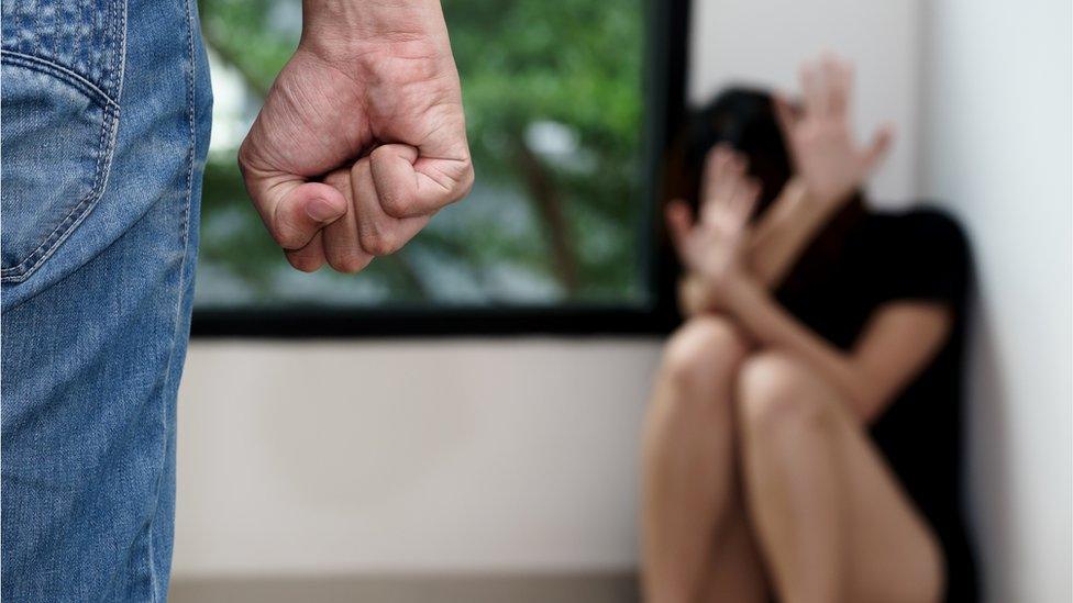 Picture posed by models of domestic abuse